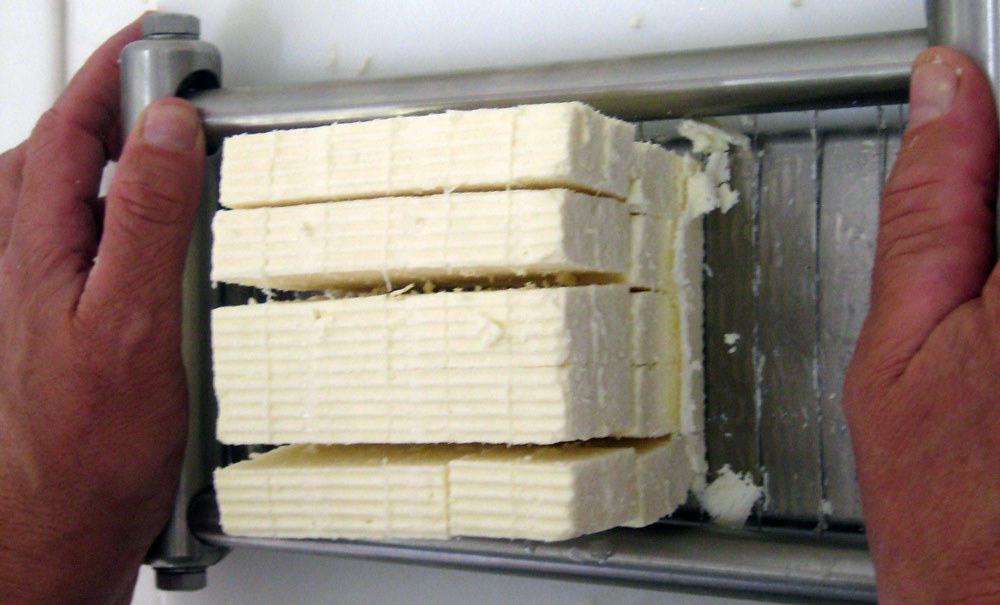 Block Cheese Cutting on the Wire Cutter B 